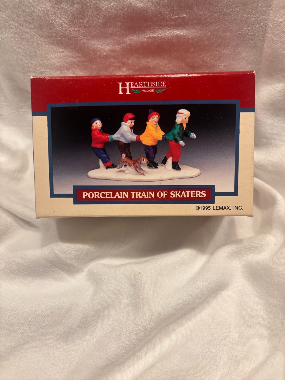 Hearthside Village Porcelain Train of Skaters - Multicolor Figurine